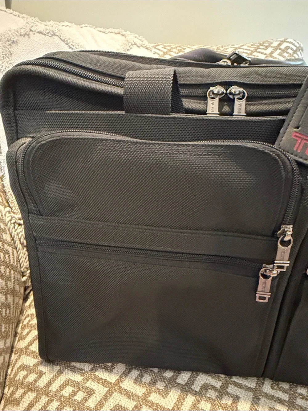 Tumi Black Laptop Briefcase with Red Logo Tag